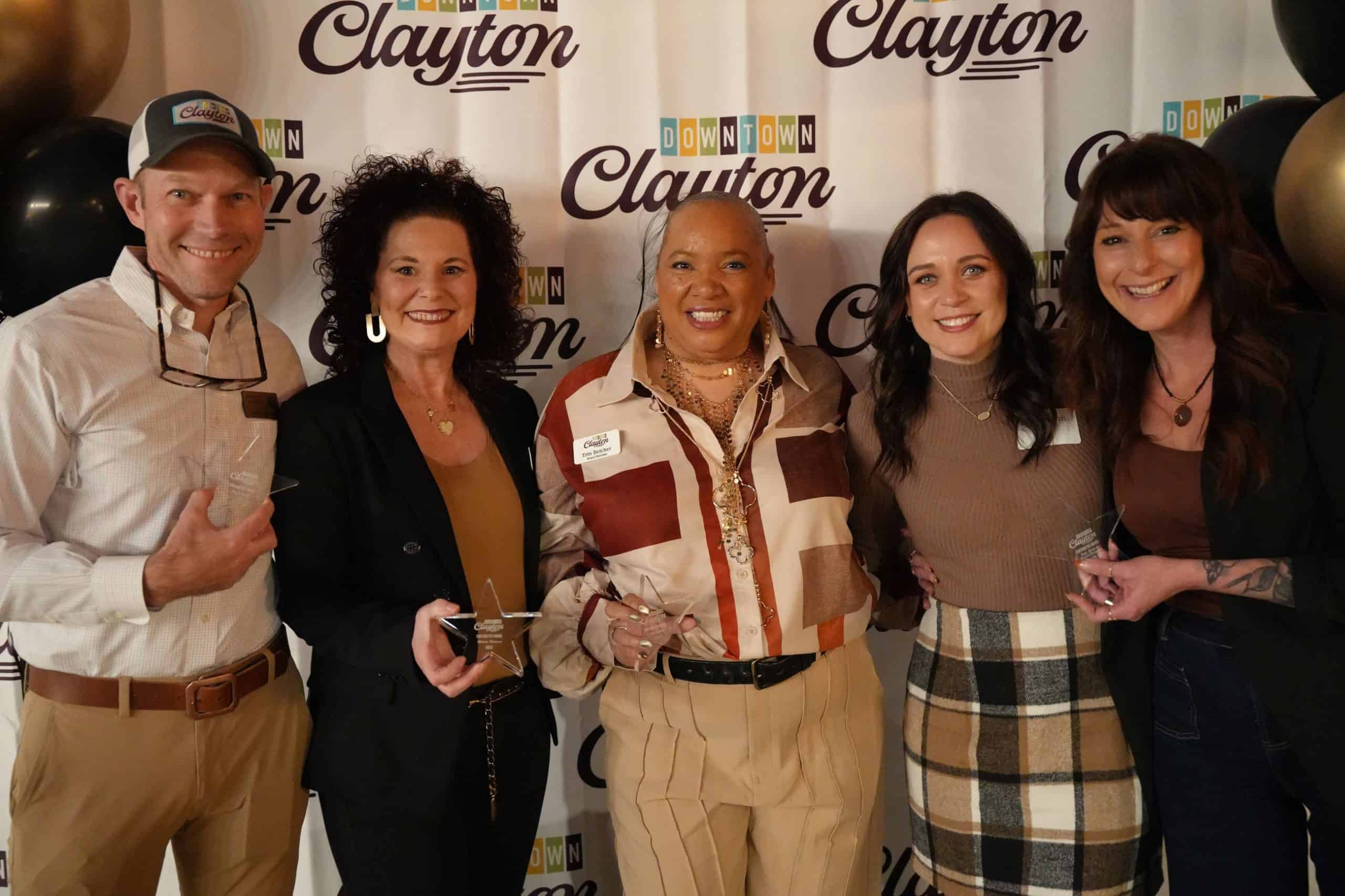 Downtown Clayton Community Members hold awards